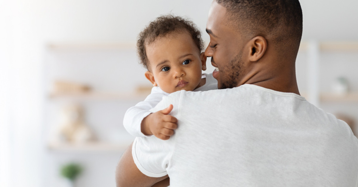 Father holding a baby