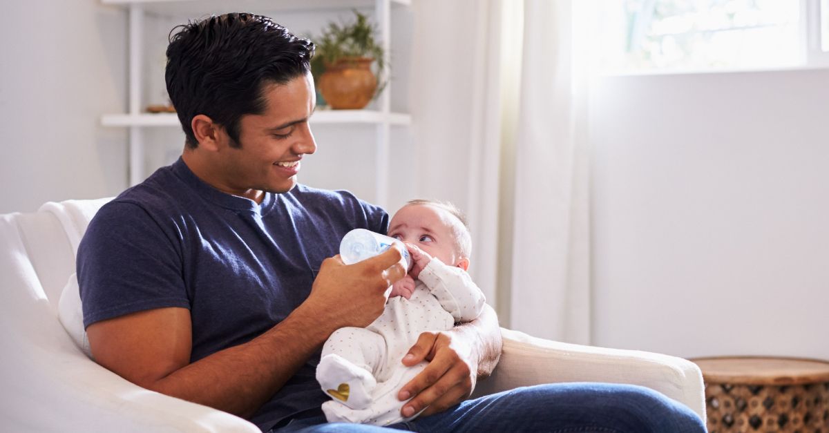 A father feeding his baby
